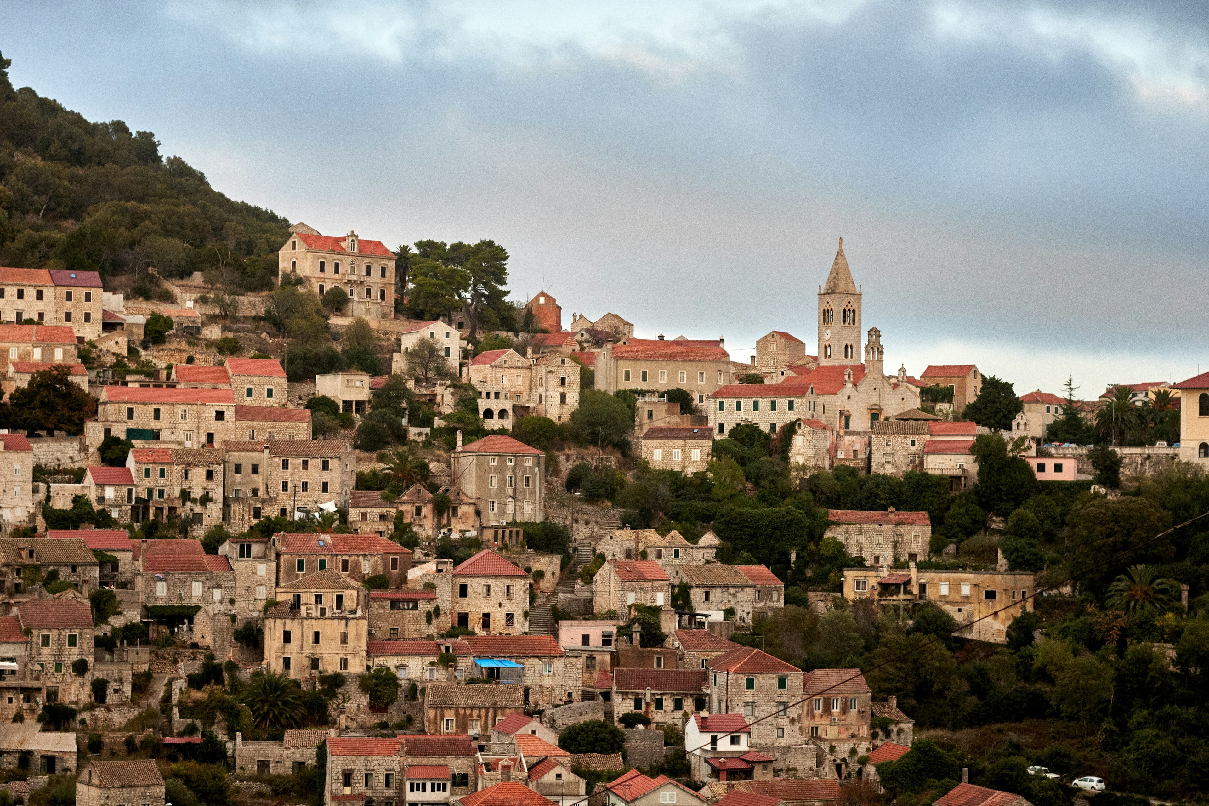 Lastovo Island hilltop village with traditional fumari chimneys