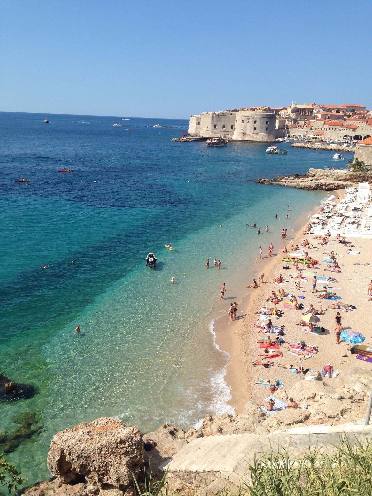 Aerial view of Banje Beach in Dubrovnik with turquoise water