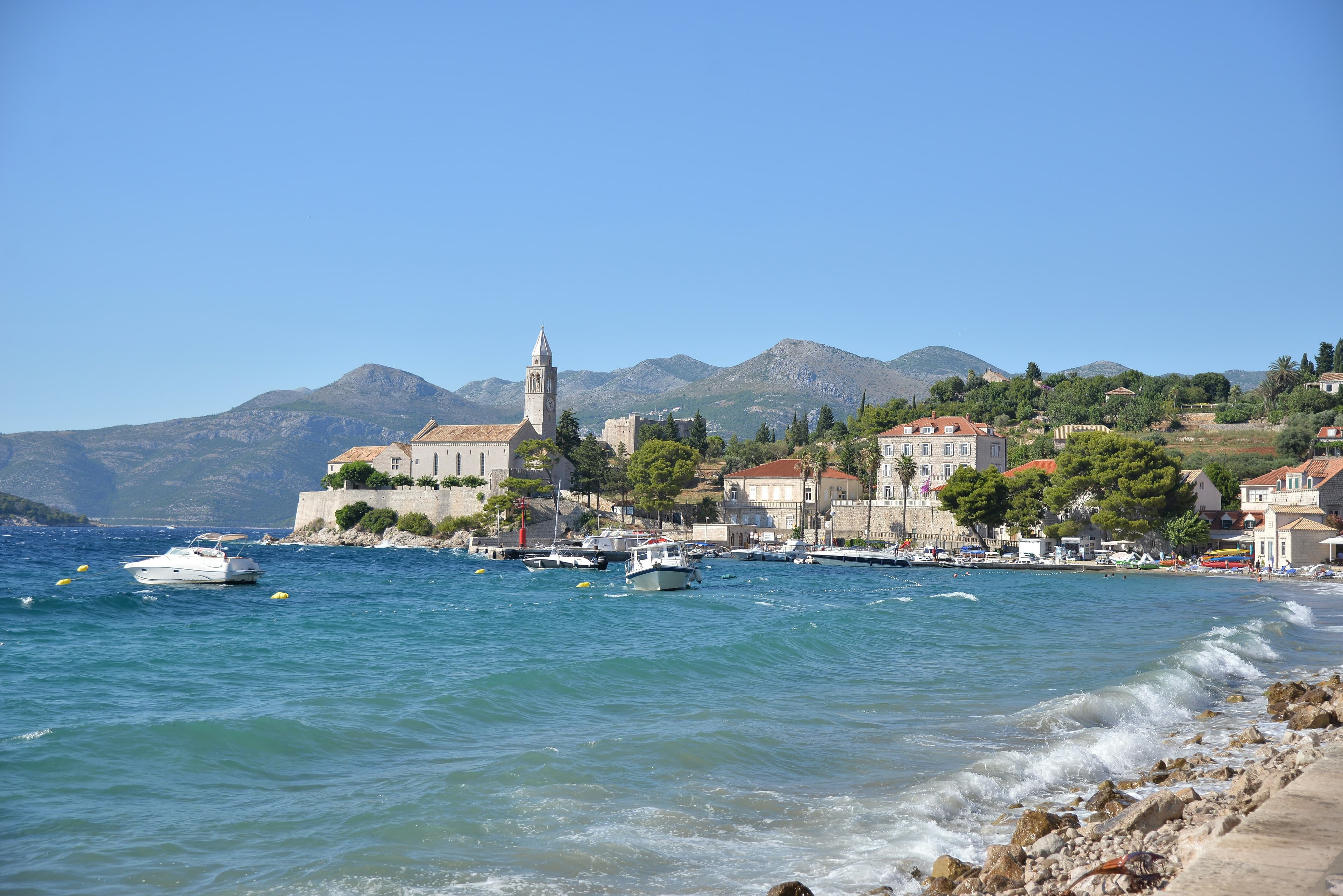 Lopud island waterfront with elegant stone villas and Mediterranean gardens